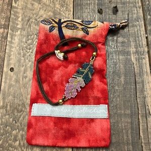 Noonday bracelet with bag